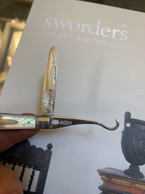 Lot 23 - Three silver and mother-of-pearl combination folding fruit knives