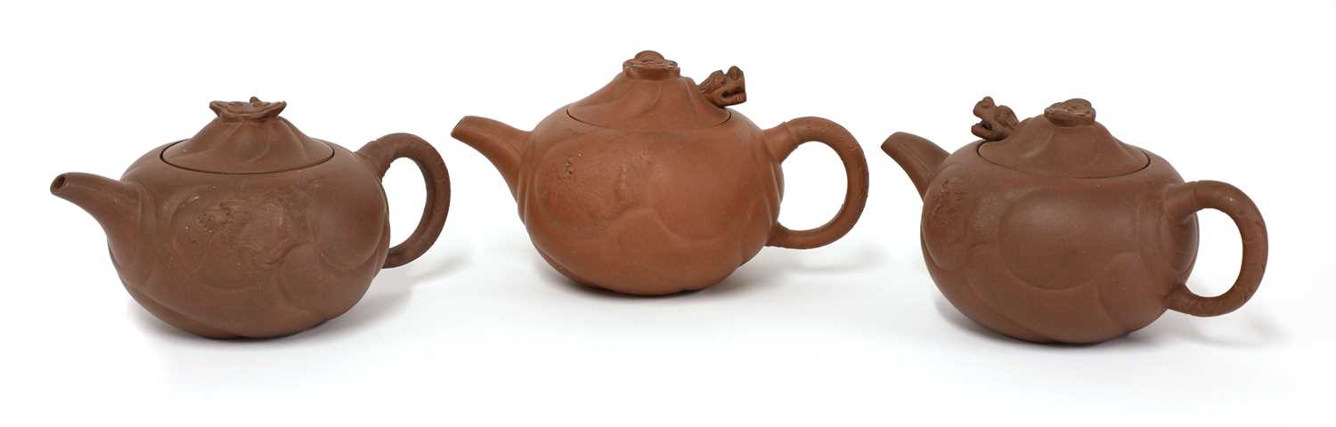 Lot 33 - A collection of three Yixing zisha teapots