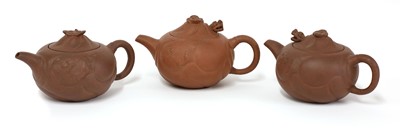 Lot 33 - A collection of three Yixing zisha teapots