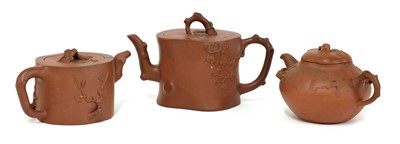 Lot 35 - A collection of three Chinese Yixing zisha teapots