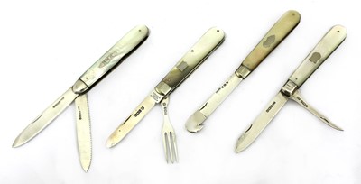 Lot 33 - Four silver and mother-of-pearl folding fruit knives