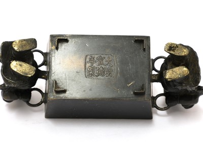 Lot 69 - A Chinese bronze incense burner