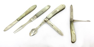 Lot 31 - Three silver and mother-of-pearl folding fruit knives and a fork