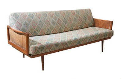 Lot 334 - A Danish teak and rattan daybed