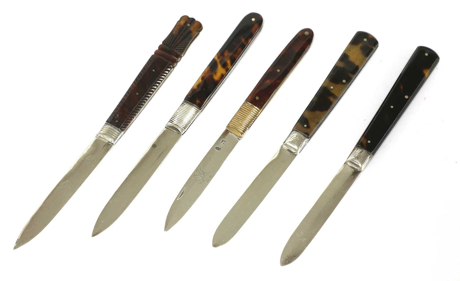 Lot 38 - Five silver and tortoiseshell folding fruit knives