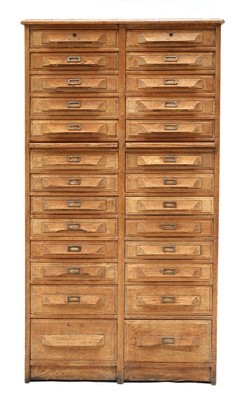 Lot 397 - An oak chest of twenty-six drawers