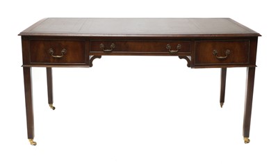 Lot 918 - A mahogany 'Reprodux' leather topped table