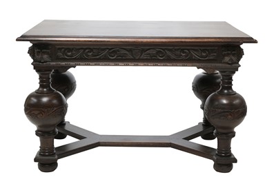 Lot 907 - A large oak dining table