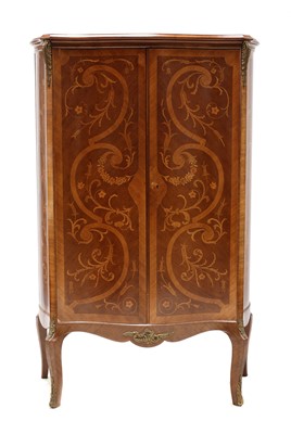 Lot 741 - A parquetry serpentine cabinet
