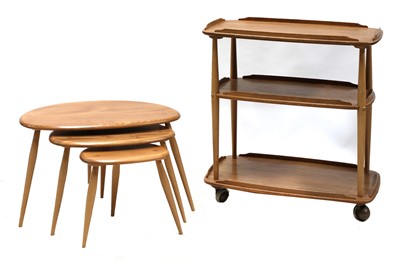 Lot 445 - An Ercol nest of three 'Pebble' tables