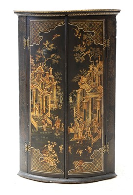 Lot 914 - An antique japanned hanging corner cupboard