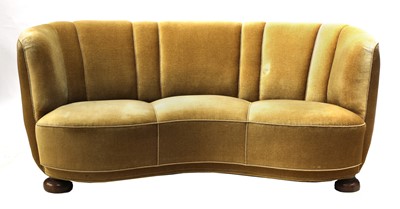 Lot 527 - A Danish three-seater 'banana' settee