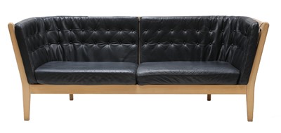 Lot 473 - A three seater leather settee