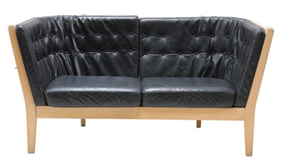Lot 472 - A two-seater leather settee