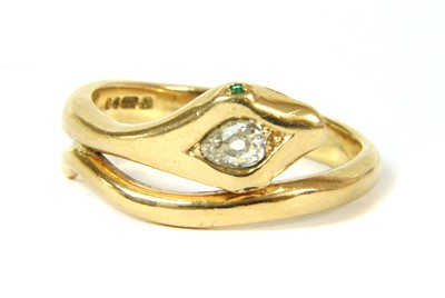 Lot 44 - An 18ct gold diamond and emerald snake ring