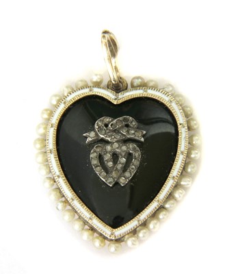 Lot 10 - A Victorian gold onyx, diamond, enamel and seed pearl heart pendant