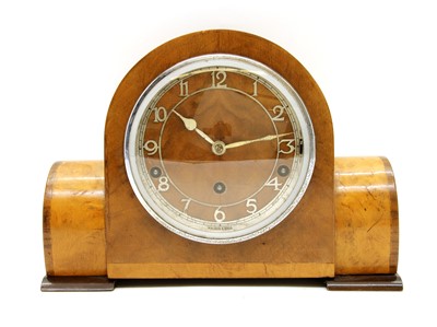 Lot 112 - An Art Deco walnut mantel clock