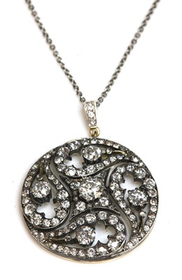 Lot 64 - A Victorian diamond set circular pendant