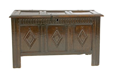 Lot 99 - An oak triple-panelled coffer