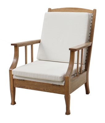 Lot 142 - A Swedish Arts and Crafts oak lounger chair