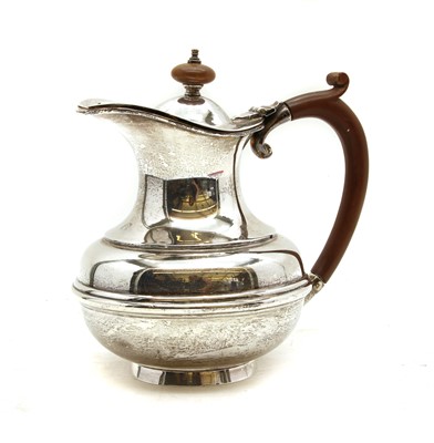 Lot 147 - An Edwardian silver hot water jug, Birmingham 1928