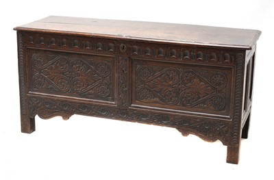 Lot 631 - An oak coffer