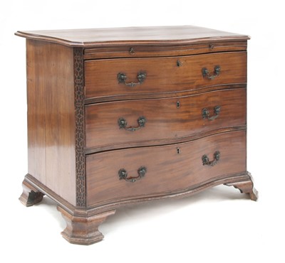 Lot 579 - A George III mahogany serpentine commode