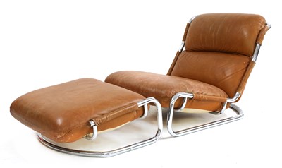 Lot 535 - A tan leather and chrome lounger and stool