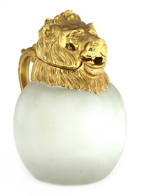 Lot 416 - An unusual gilt-plated jug