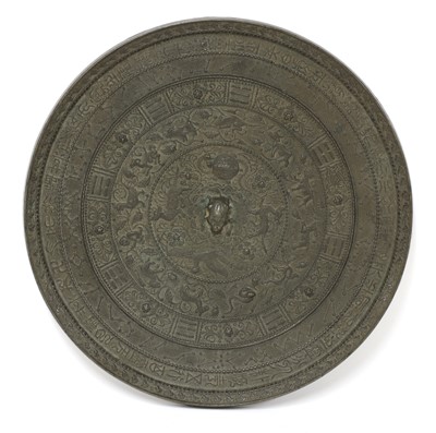 Lot 211 - A Chinese bronze mirror