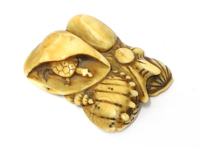 Lot 224 - A Japanese Edo period marine ivory netsuke