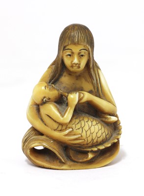 Lot 225 - A Japanese ivory netsuke
