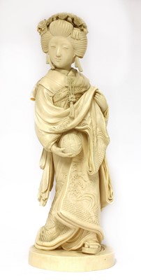 Lot 221 - A Japanese Meiji period ivory okimono