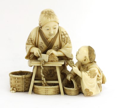 Lot 229 - A Japanese Meiji period ivory okimono