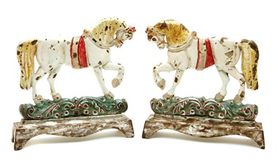 Lot 442 - A pair of polychrome decorated door porters