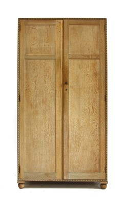 Lot 429 - An Heal's limed oak wardrobe