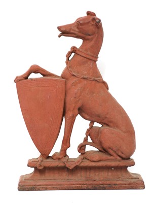Lot 589 - A country house cast iron armorial doorstop