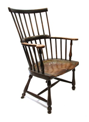 Lot 92 - An ash and elm comb back Windsor armchair