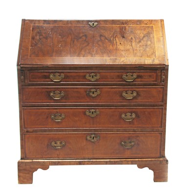 Lot 112 - A George III walnut and feather banded bureau