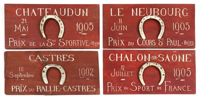 Lot 128 - Four mounted horseshoes