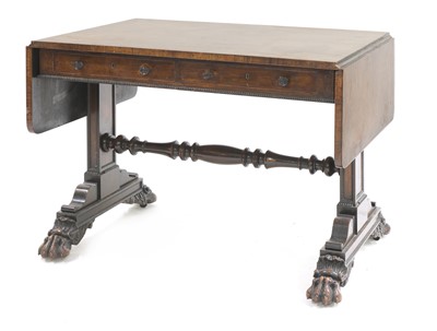 Lot 547 - A Regency carved rosewood sofa table