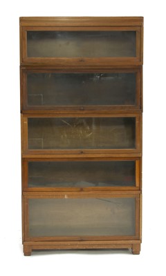 Lot 819 - An early 20th Century walnut Globe Wernicke modular bookcase