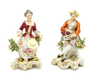 Lot 251 - A pair of Chelsea Gold Anchor style figures of a Lady and Gallant