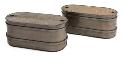 Lot 386 - A pair of bronzed steel planters/plinths