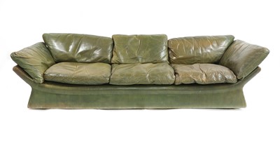 Lot 503 - A green leather settee