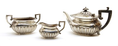 Lot 439 - A silver three piece tea set