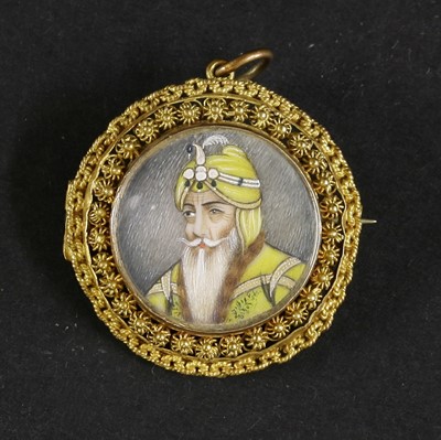 Lot 304 - An Indian portrait miniature on ivory