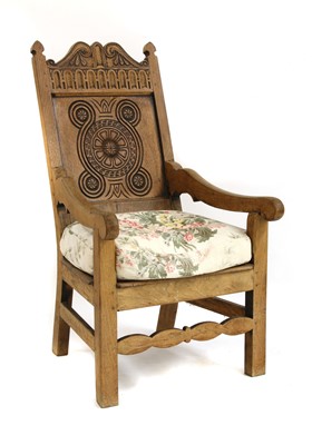 Lot 740 - An oak throne chair