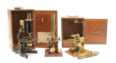 Lot 405 - A black lacquered monocular microscope