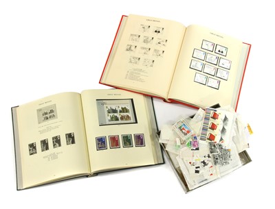 Lot 41 - Four albums and a tin of mainly mint QEII stamps